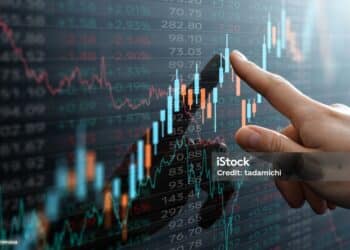 Analyst pointing the chart.