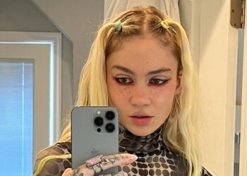 Grimes: A Artista Visionária com Uma Fortuna Diversificada!