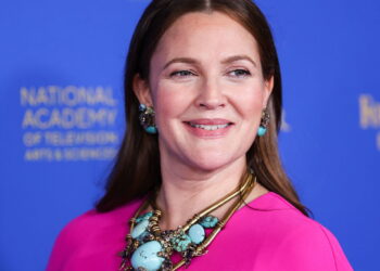Drew Barrymore: Uma Estrela de Milhões que Brilha Com o Sucesso
