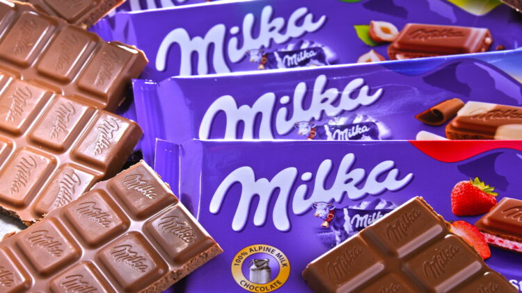 Saiba quem criou a Milka e o segredo de seu chocolate com leite alpino!