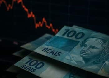 Notas de reais, incerteza econômica, gráficos.