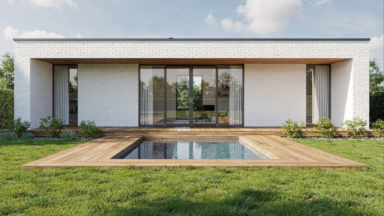 Com deck e piscina integrados ao jardim, essa casa térrea modular é a definição de refúgio moderno para famílias pequenas