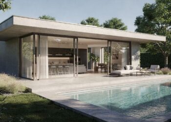 Com cozinha em ilha e fachada de vidro, esse projeto de 90 metros quadrados resolve bem lotes pequenos