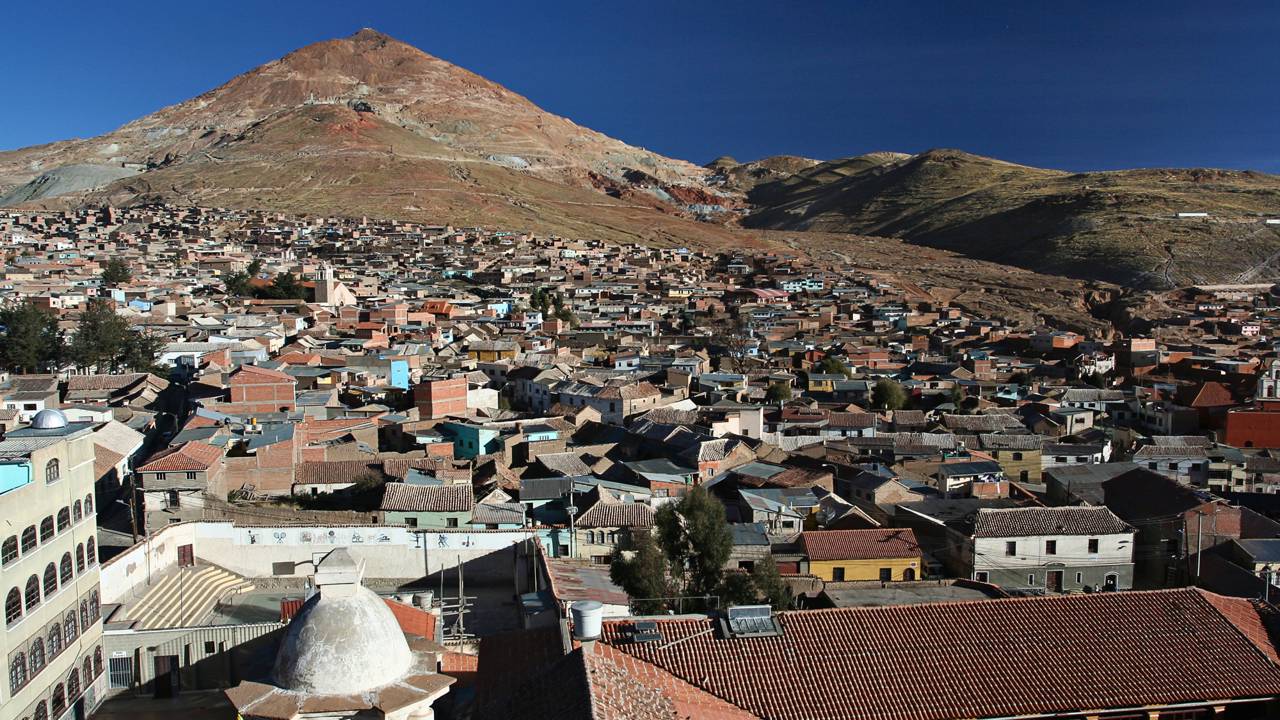 A história de riqueza extrema e tragédia humana nas grandes montanhas de mineração