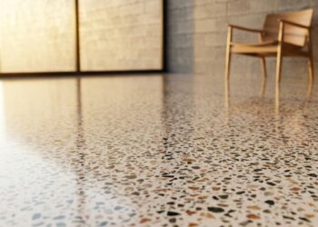 A mistura de pó de mármore com cimento branco cria um revestimento liso, resistente e com aparência de pedra natural sem precisar de granito ou porcelanato