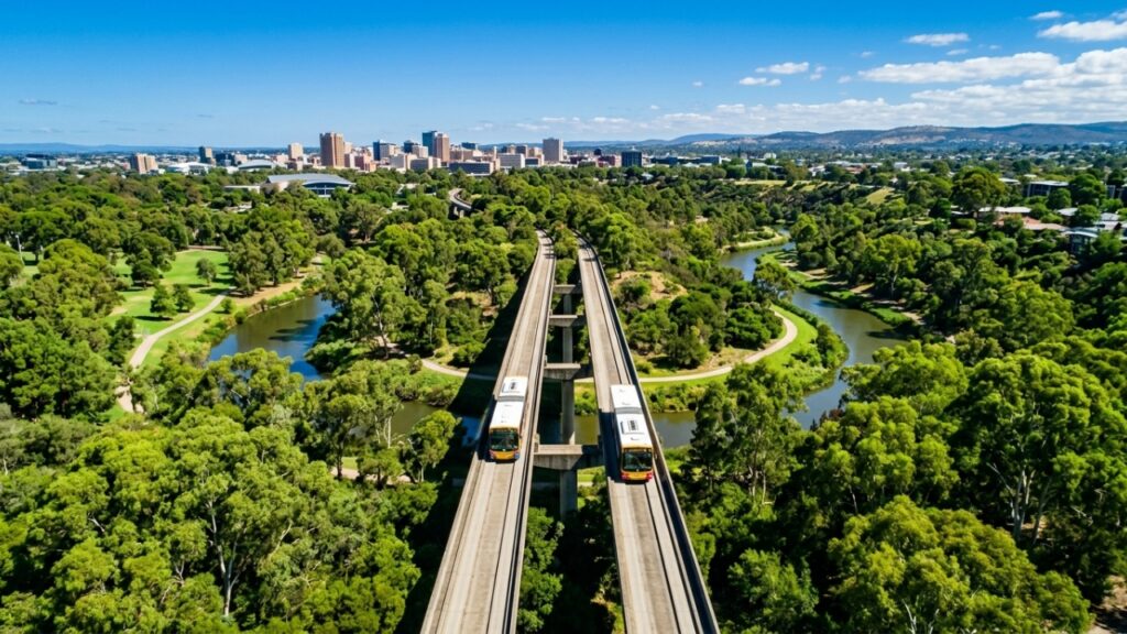 O bizarro sistema de transporte na Austrália onde ônibus comuns entram em trilhos de concreto e viajam a 100 km/h sem volante